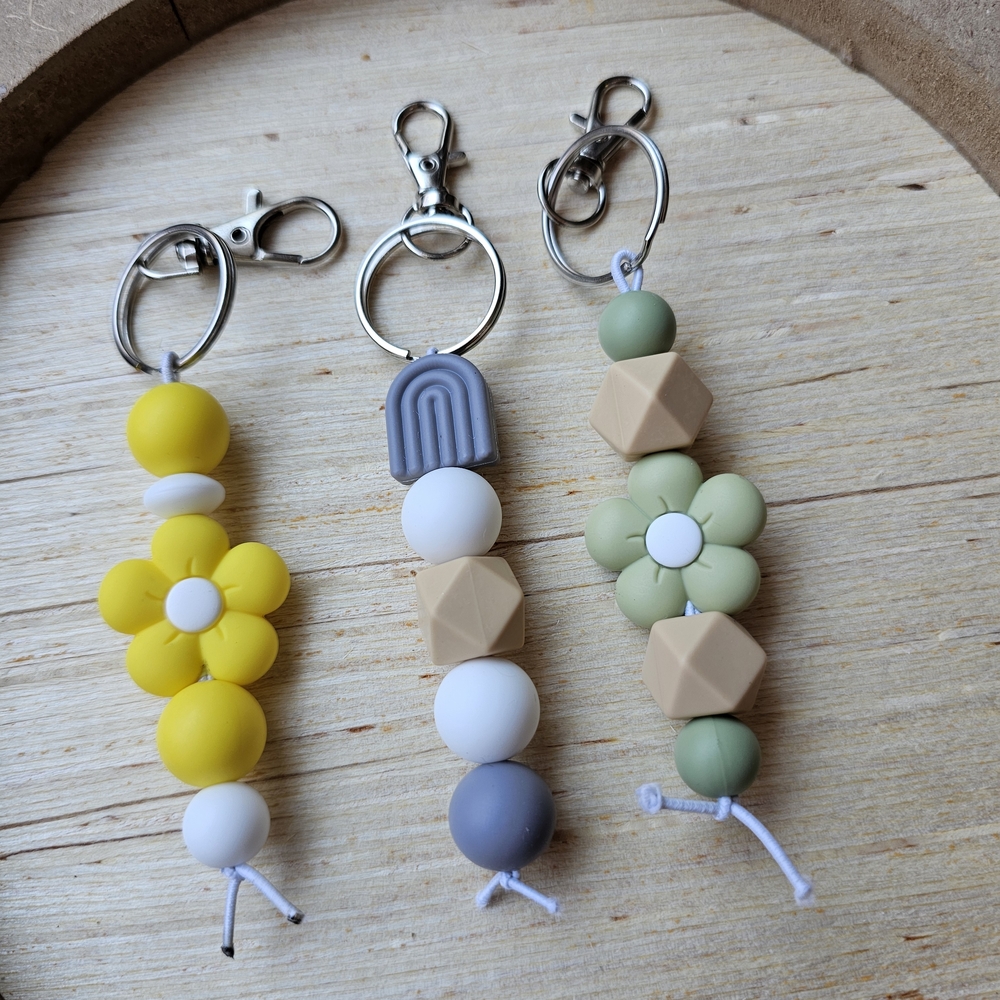 Colorful Beaded Keychains with Flower and Geometric Designs